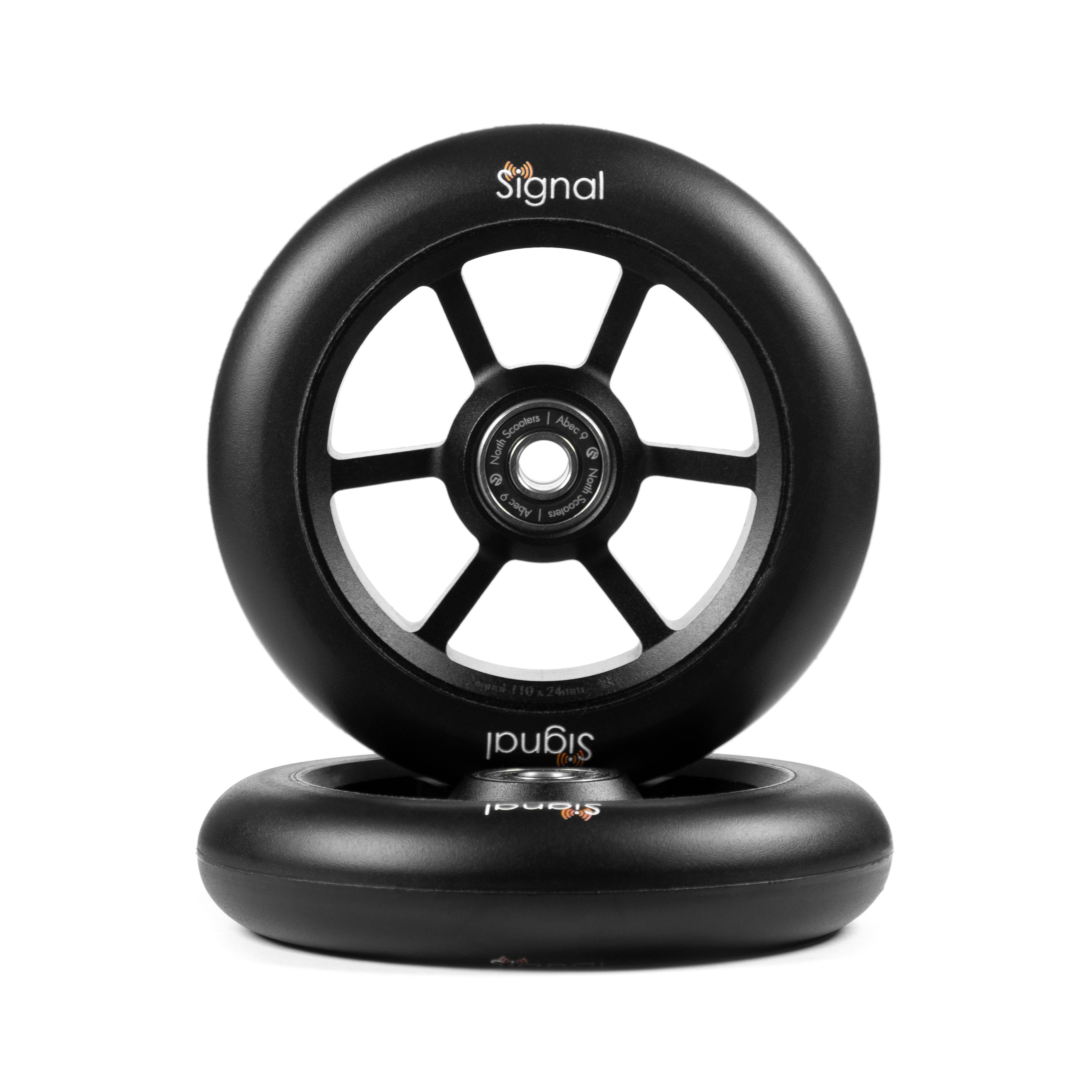 Two black scooter wheel with 'Signal' branding in white text