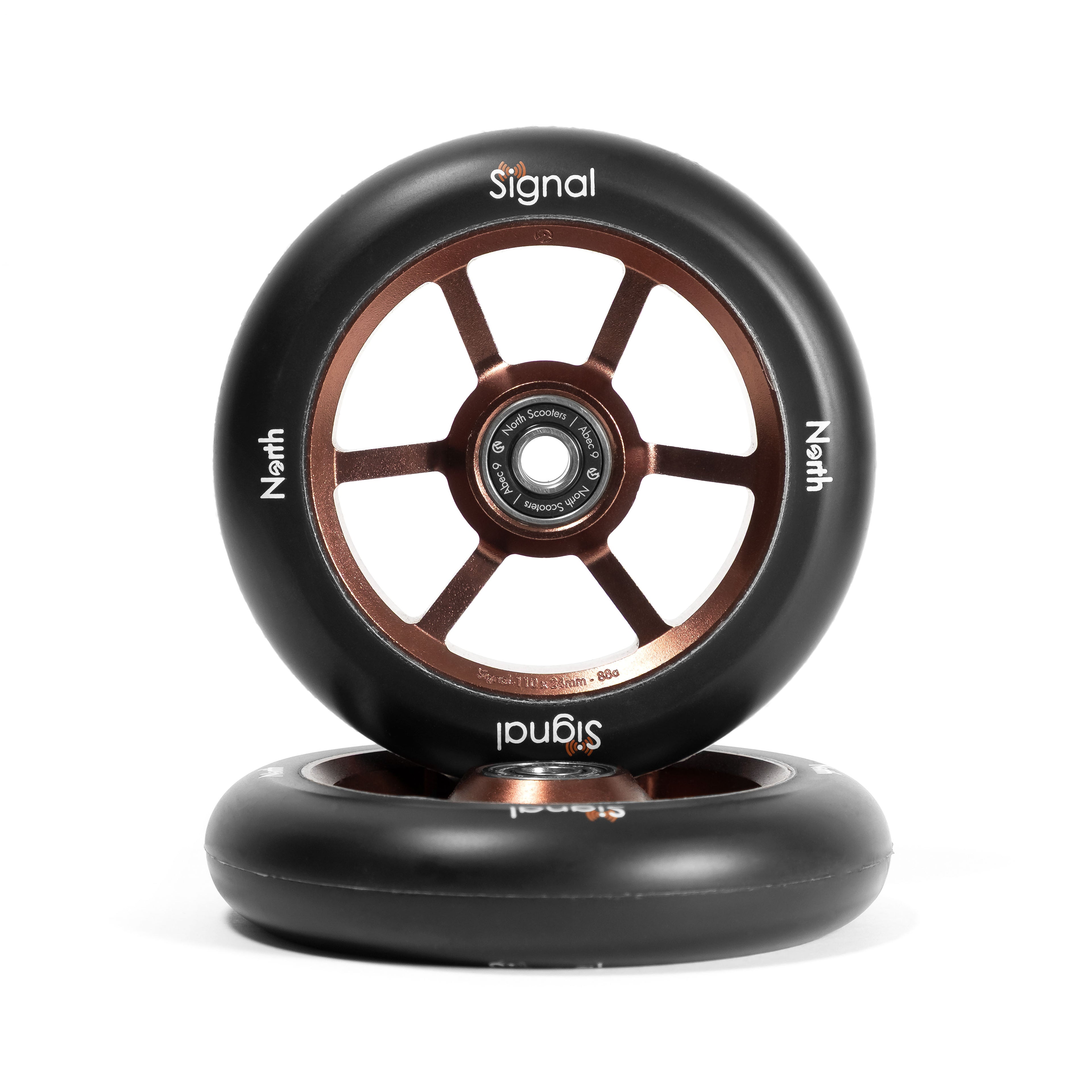 Two black scooter wheels with brown center and 'Signal' branding on a white background