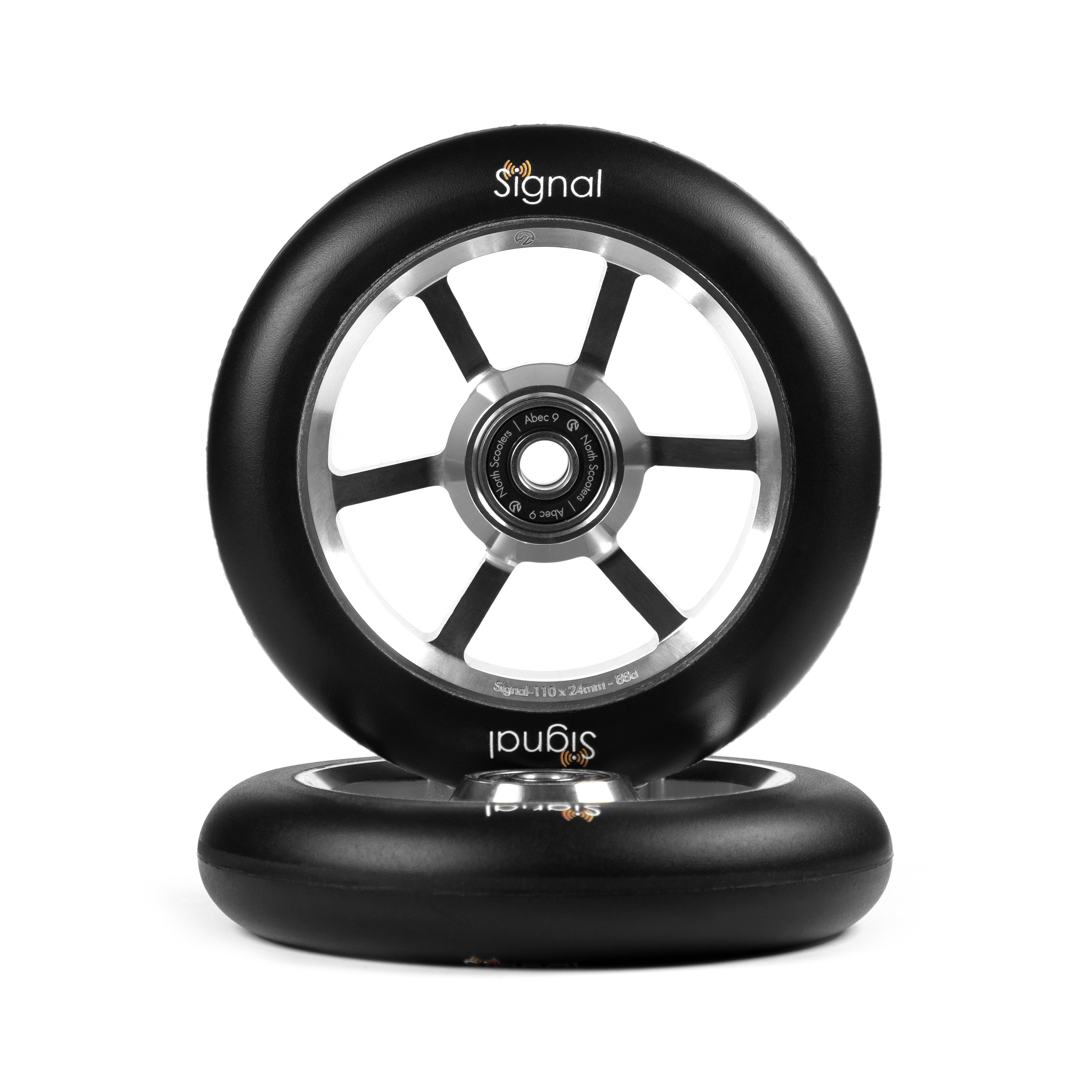 Two black scooter wheels with silver centers on a white background, featuring the 'Signal' brand.